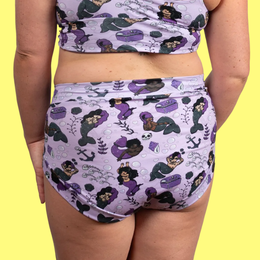 Organic cotton briefs by Wilde Mode X Arkolina, handmade by Designed By Debz, featuring detailed black siren design on black fabric.