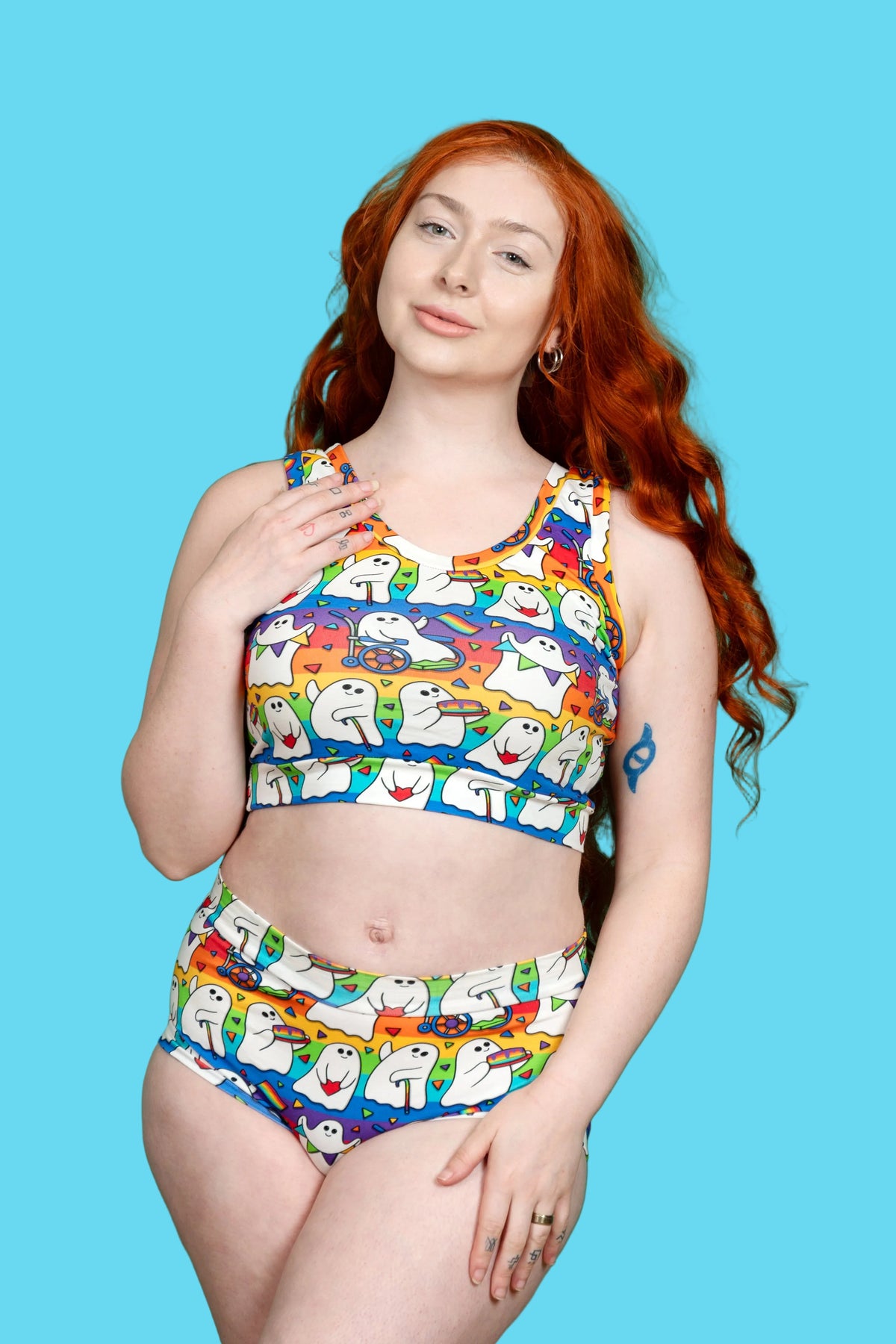 picture of a woman with red hair and green eyes wearing pride ghosts underwear