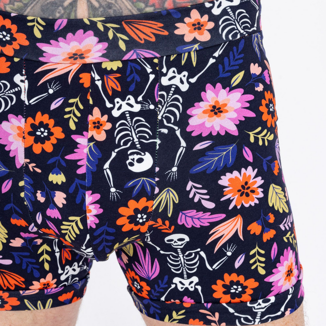 Organic cotton boxers with a dancing skeleton print from Designed By Debz, featuring a comfortable fit and fun spooky design.
