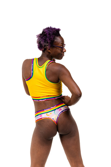 Colorful briefs with mermaid design and rainbow accents on a plain background