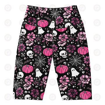 Printful Halloween pink swim biker shorts with all-over print and UPF 50+ protection, front view on white background.