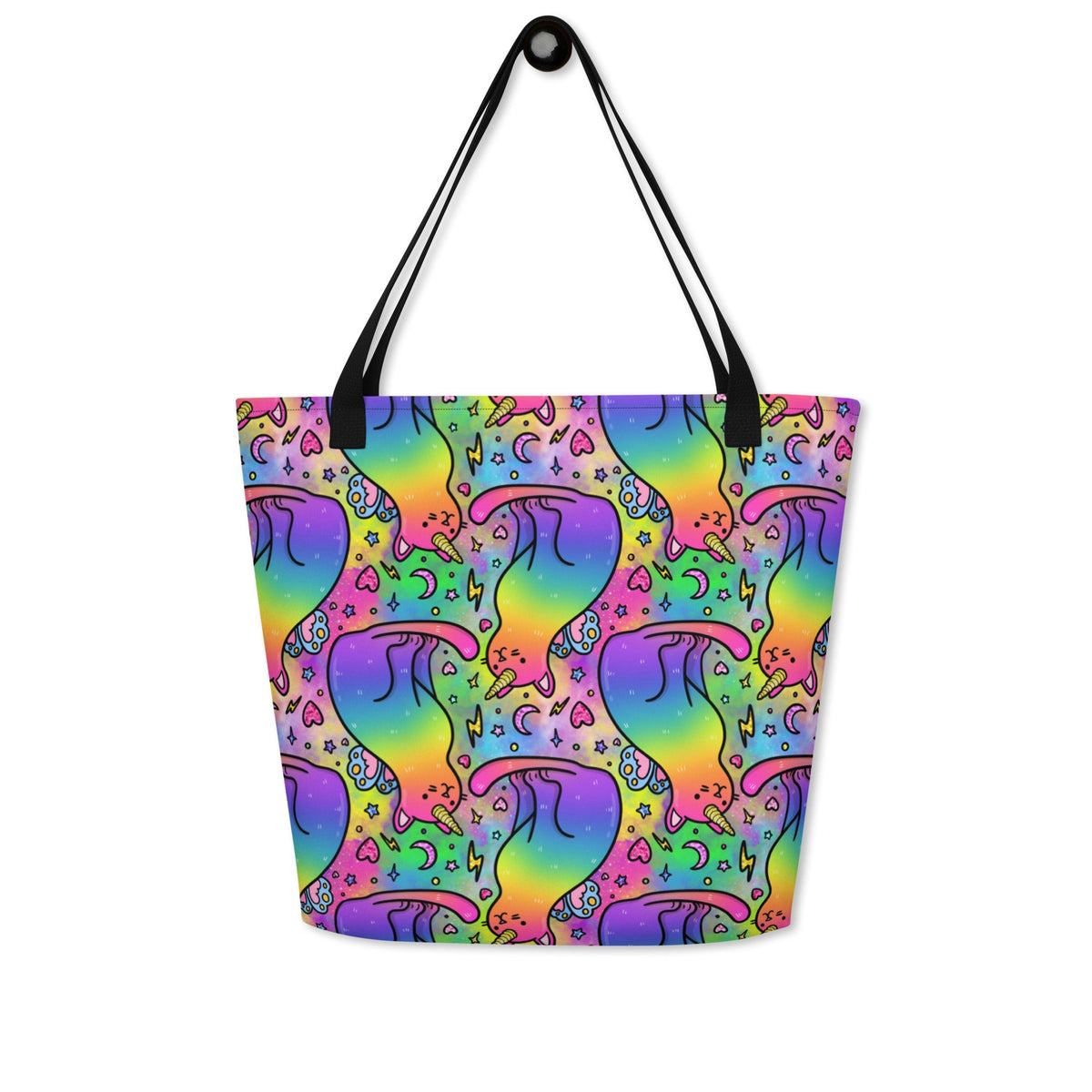 Rainbow unicorn cats large tote bag by Designed By Debz with colorful all-over print and front pocket on black background.