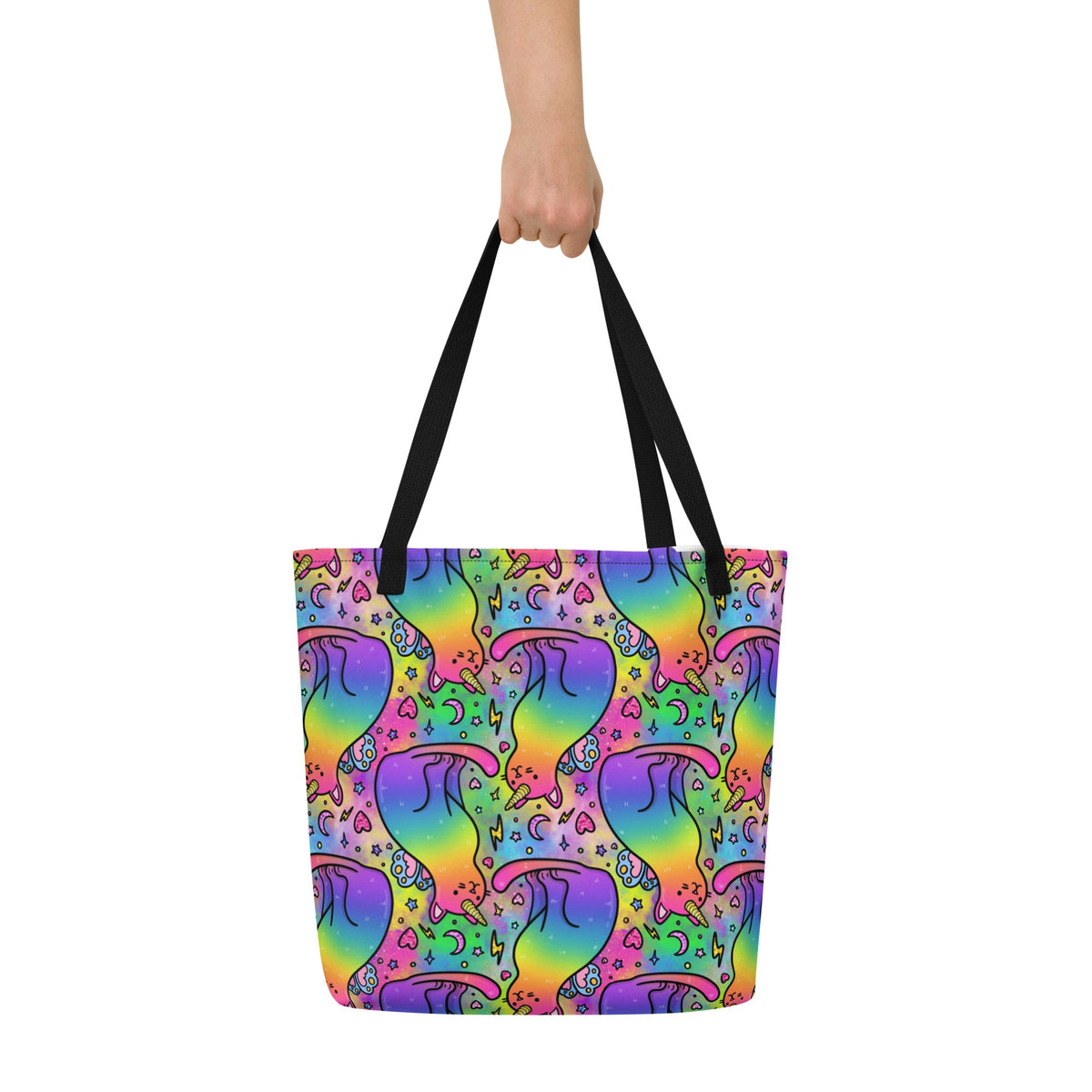 All-over rainbow unicorn cats tote bag by Designed By Debz with black back and a front pocket, large size, vibrant print.