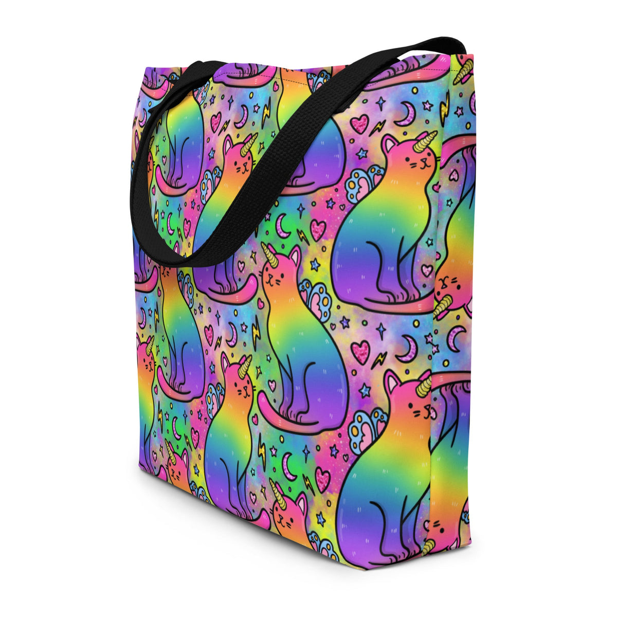 Large tote bag featuring colorful rainbow unicorn cats print, designed by Debz, with a front pocket and black background.