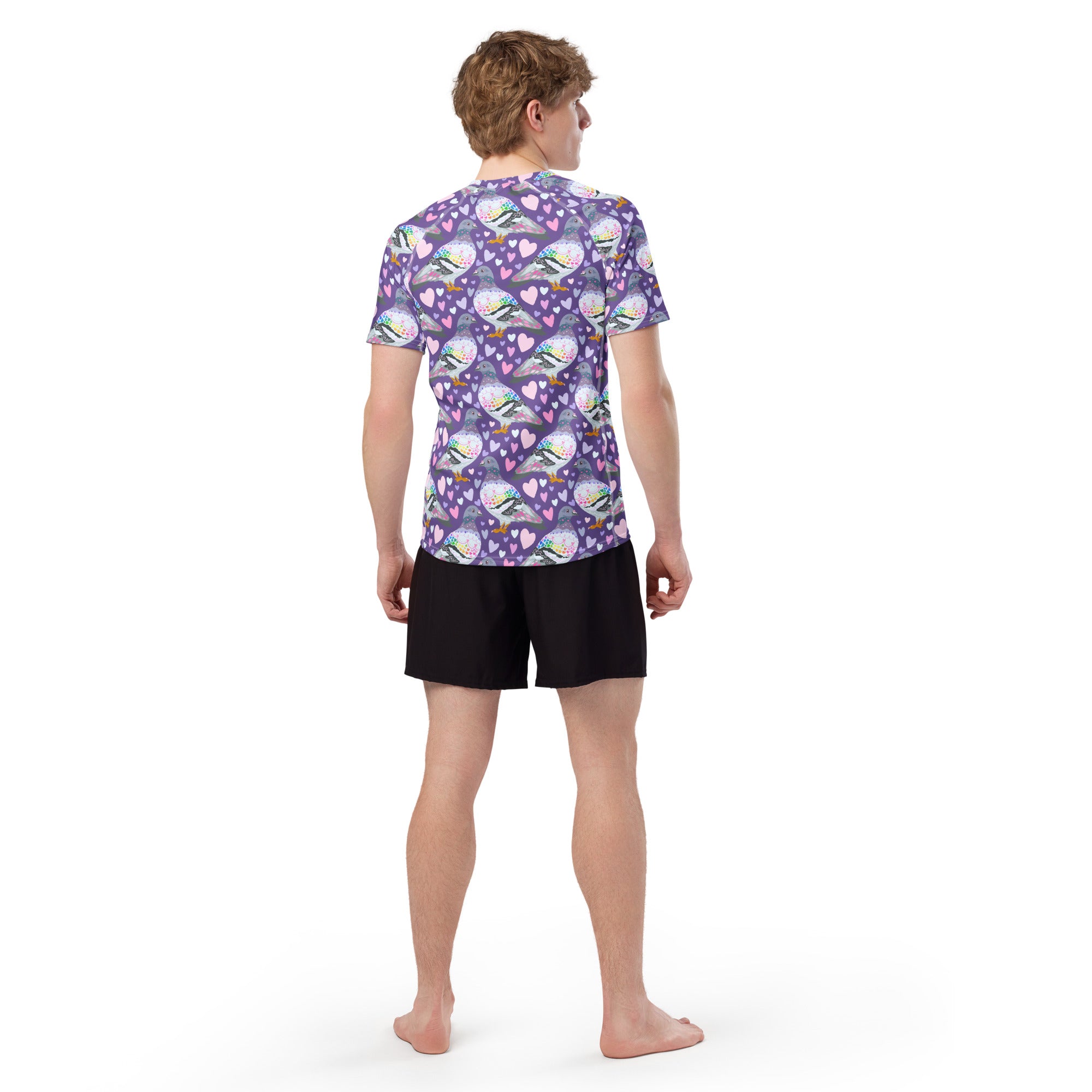 White all-over print unisex rash guard by Pigeon Love featuring short sleeves and recycled fabric, shown from the back.