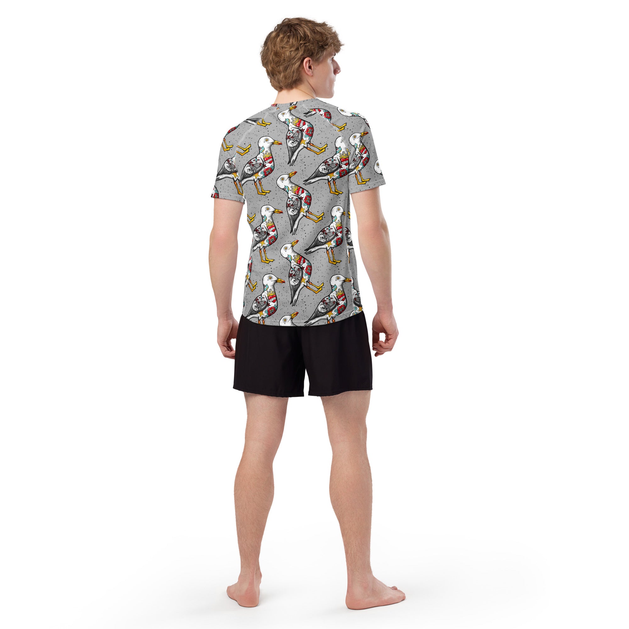 Grey Nautigul Seagull unisex short sleeve rash guard with all-over print, featuring a seagull design on recycled fabric.