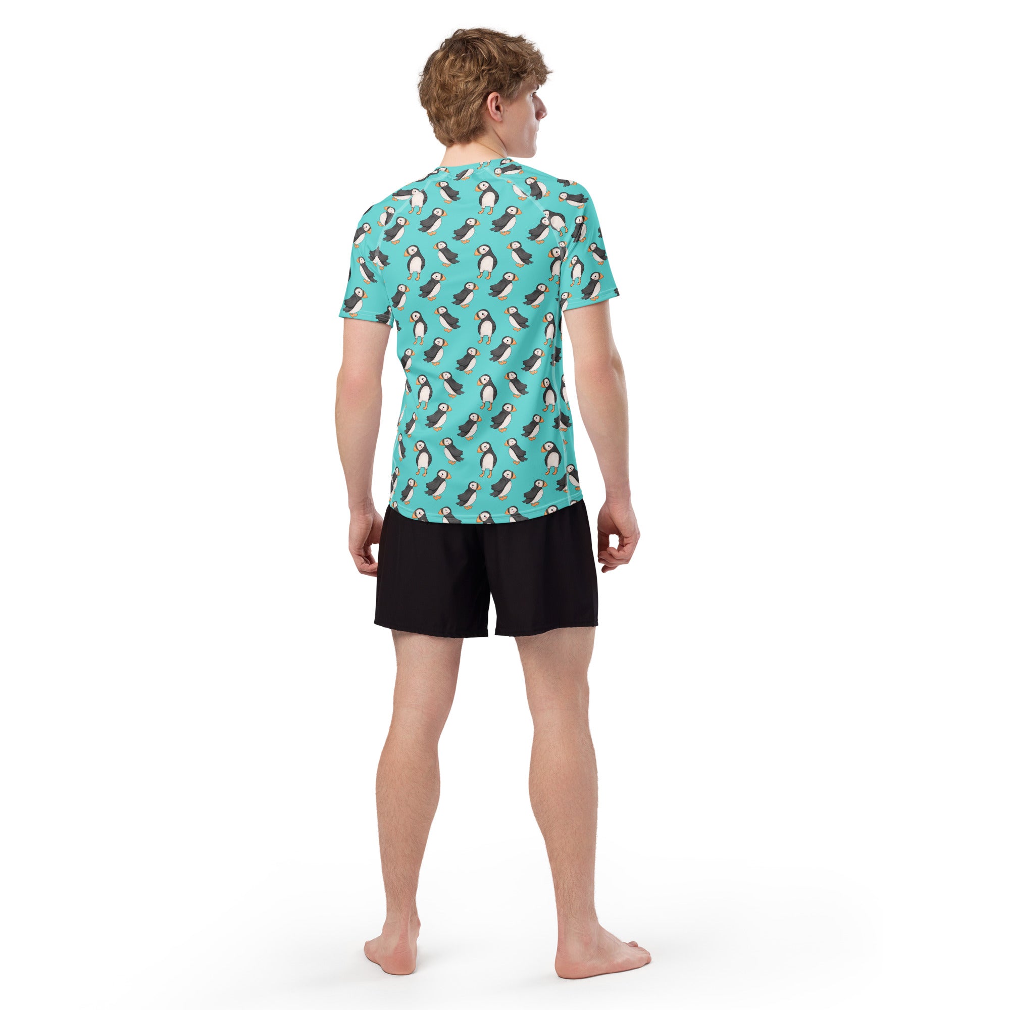 White Puffin All-Over Print Unisex Short Sleeve Rash Guard with vibrant bird design, showcasing recycled fabric details.