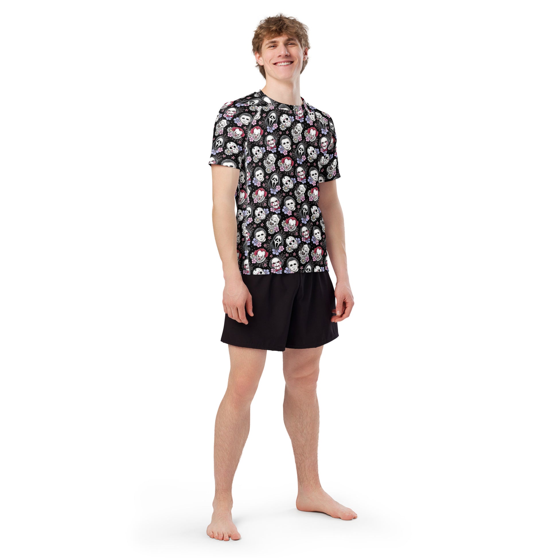 Black horror character print unisex short sleeve rash guard with all-over white design, made from recycled materials.