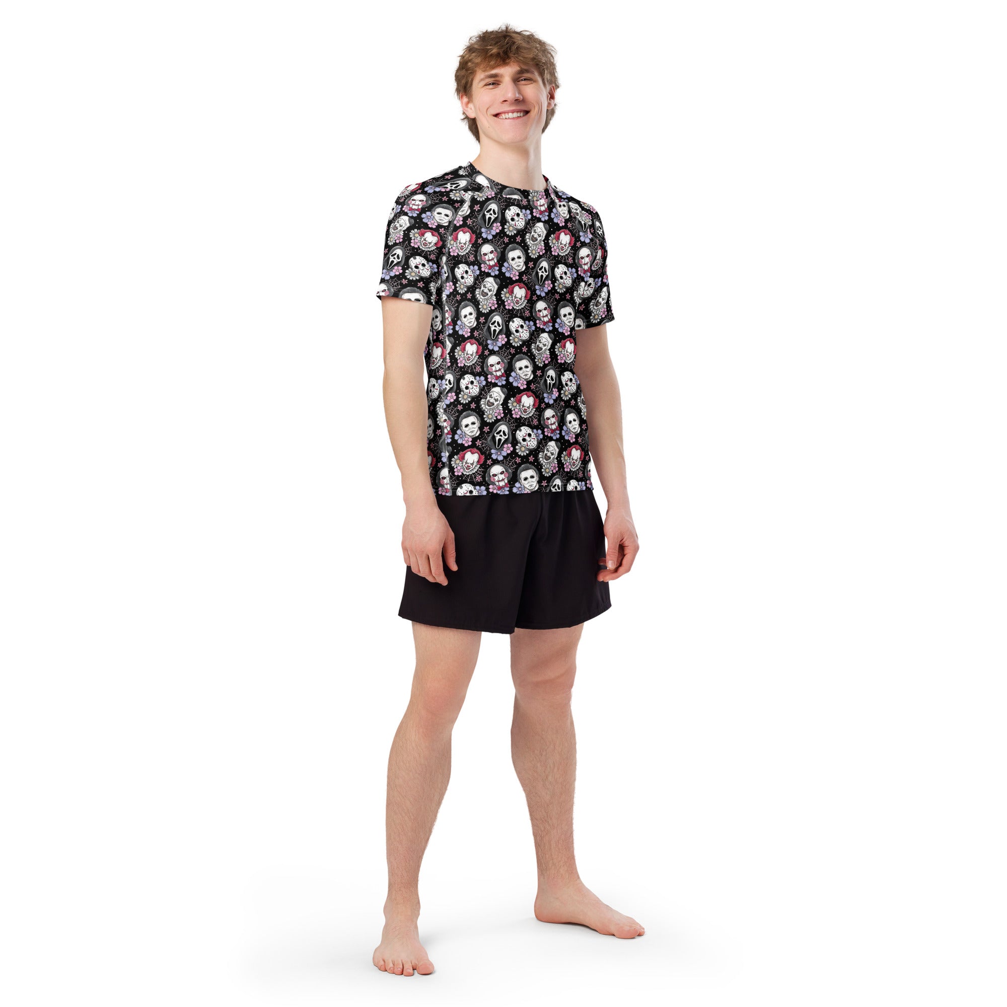 Black horror character print unisex short sleeve rash guard with all-over white design, made from recycled materials.