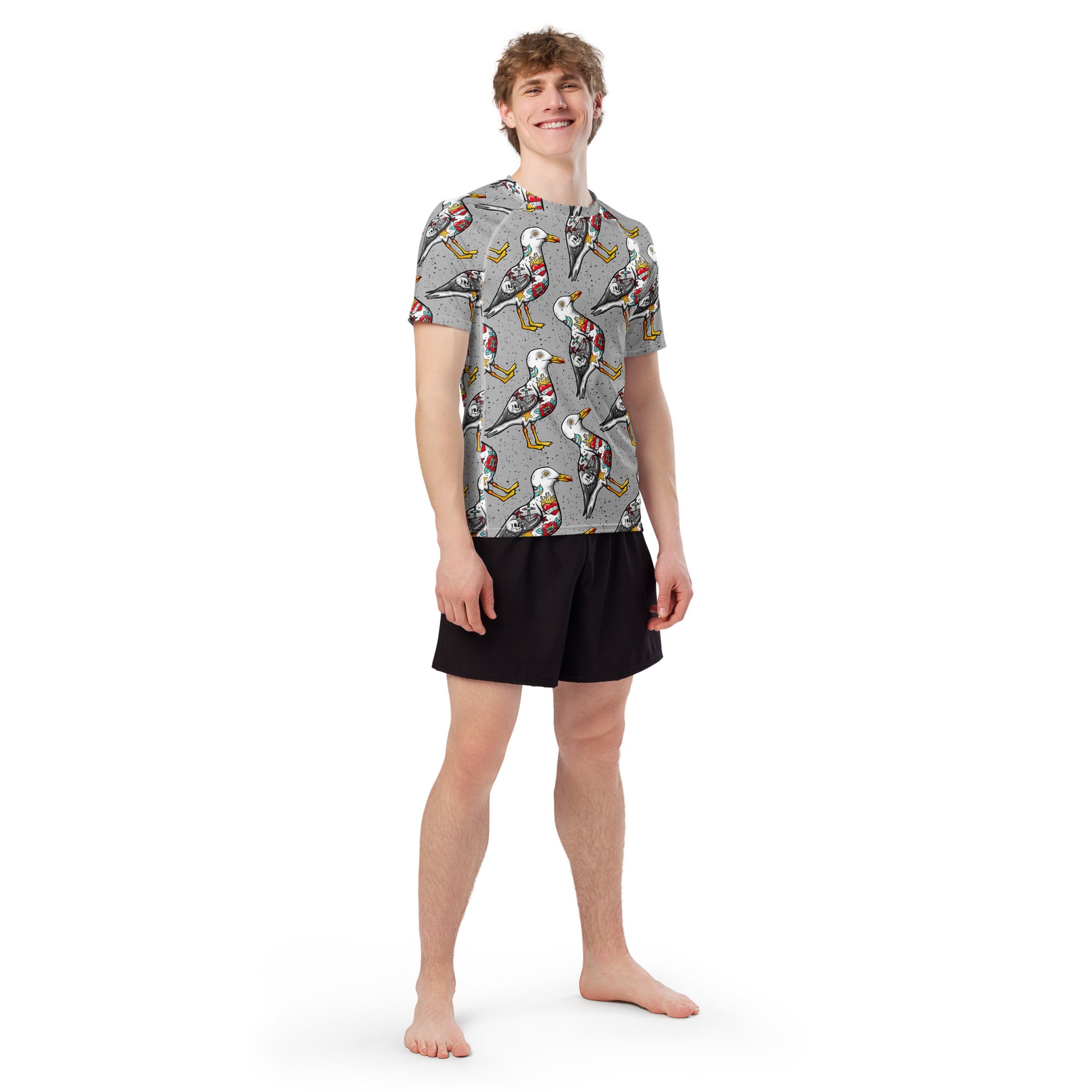Grey Nautigul Seagull all-over print unisex short sleeve rash guard with seagull design on recycled fabric, front view.