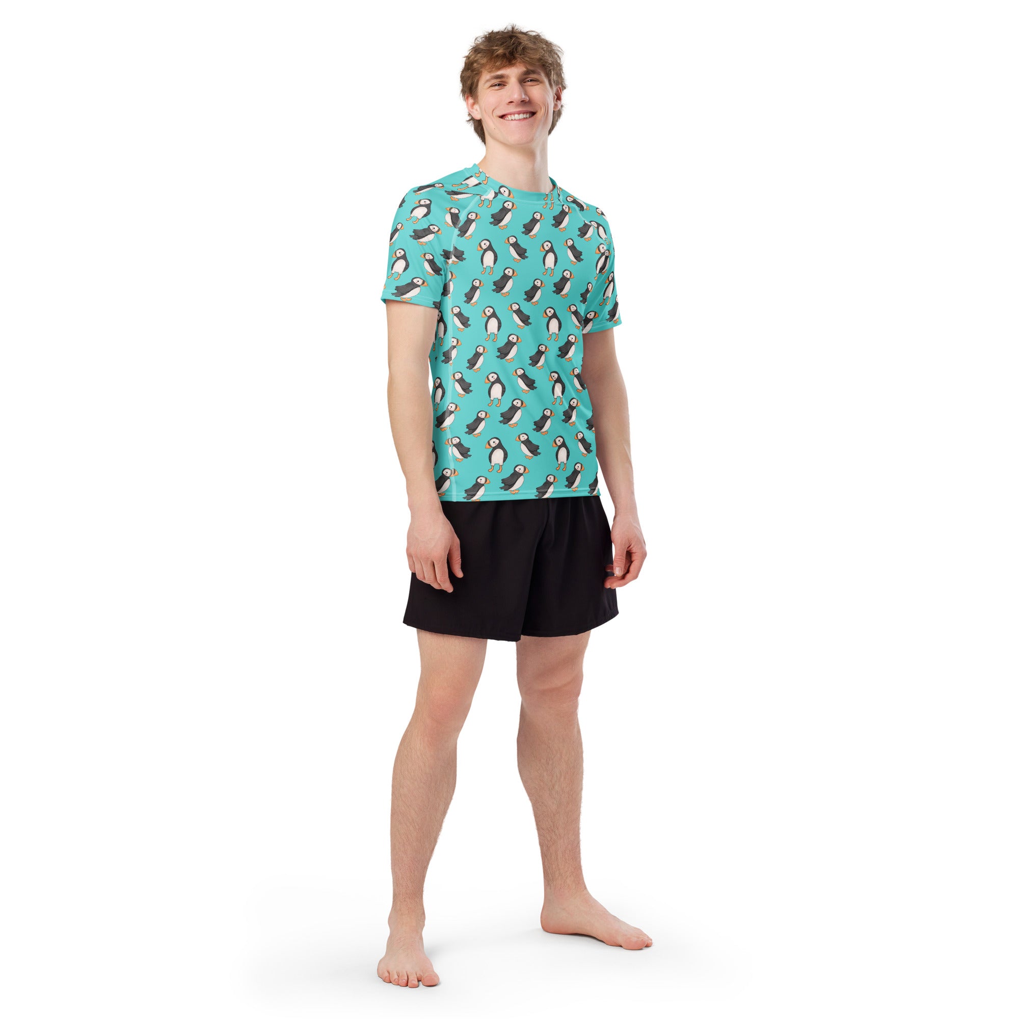 White Puffin All-Over Print Unisex Short Sleeve Rash Guard with colorful puffin design on the front.