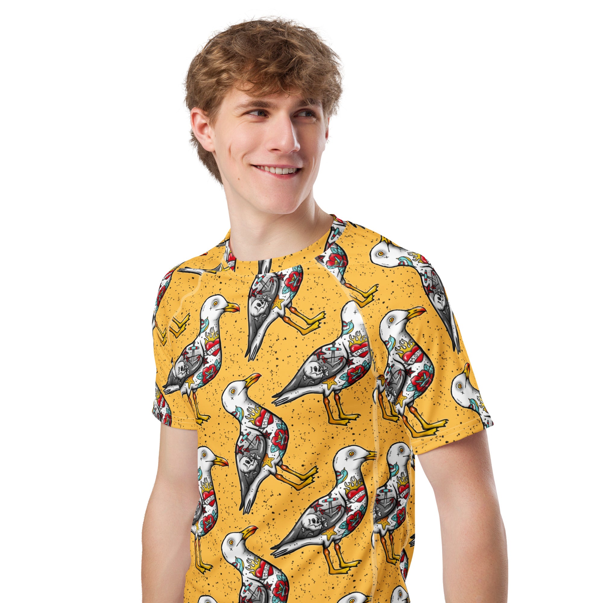 Yellow Nautigul seagull print unisex short sleeve rash guard with all-over seagull pattern and recycled fabric, front view.