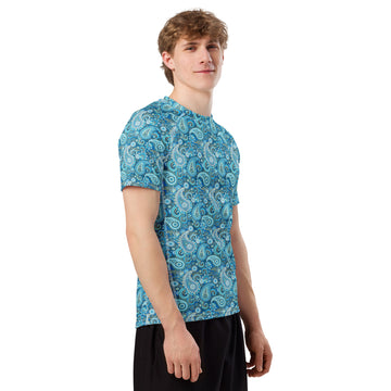 Blue paisley print men's rash guard with all-over design, short sleeves, made from recycled material, by Printful.