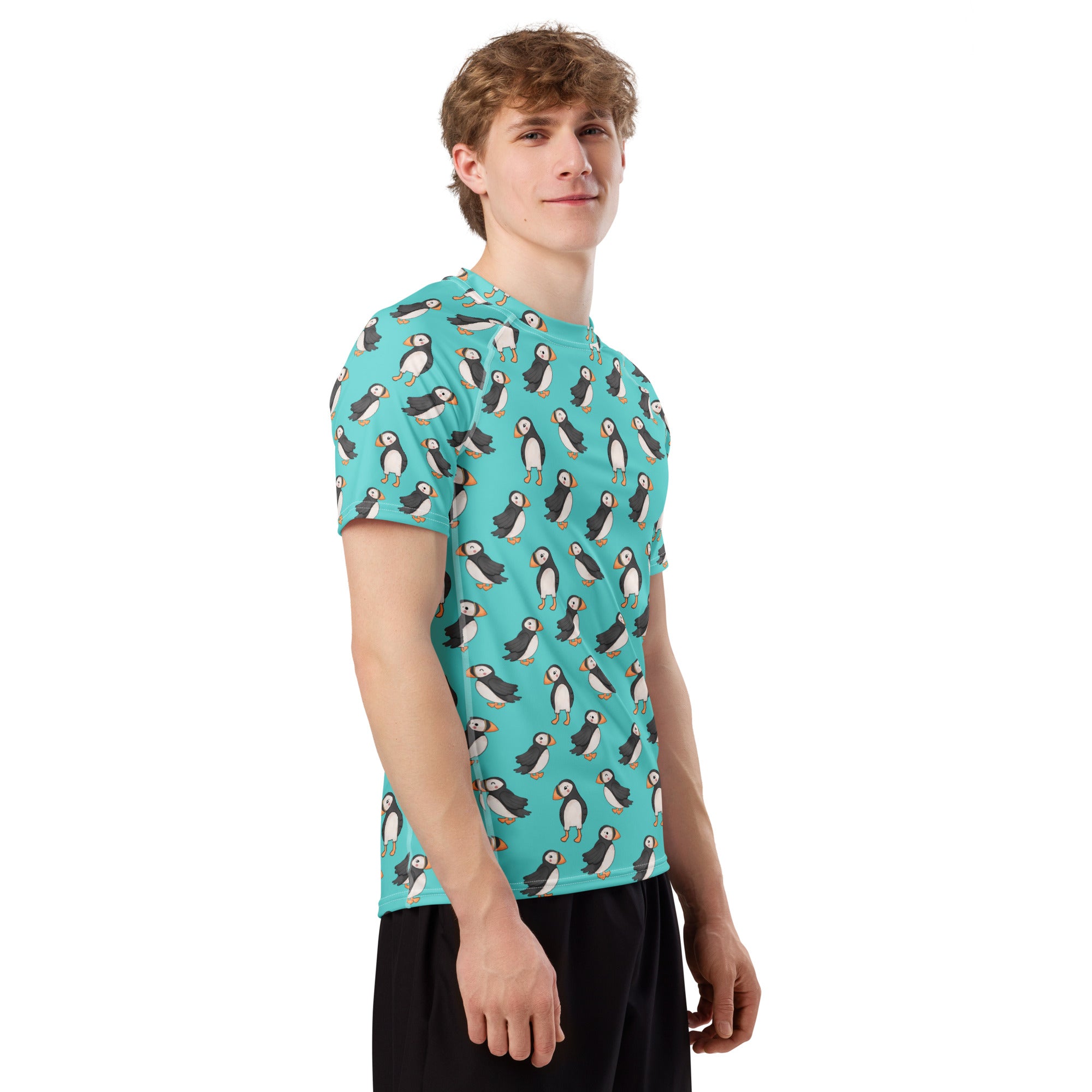 White Puffin All-Over Print Unisex Short Sleeve Rash Guard with colorful bird design, made from recycled materials.