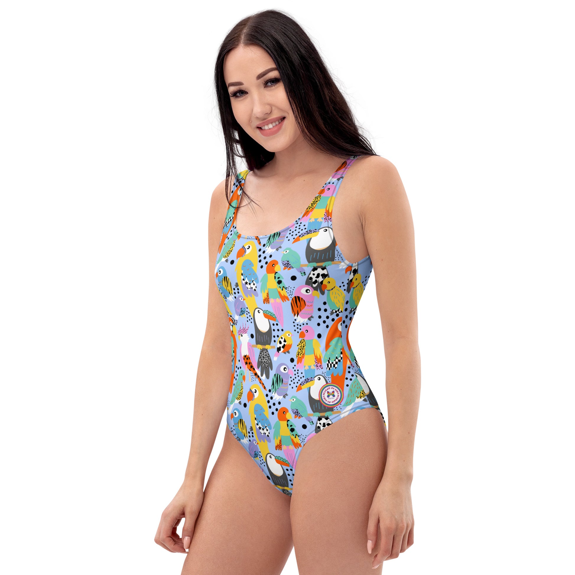 Handmade tropical birds one-piece swimsuit with all-over print, UPF 50+ protection, designed for all bodies by Printful