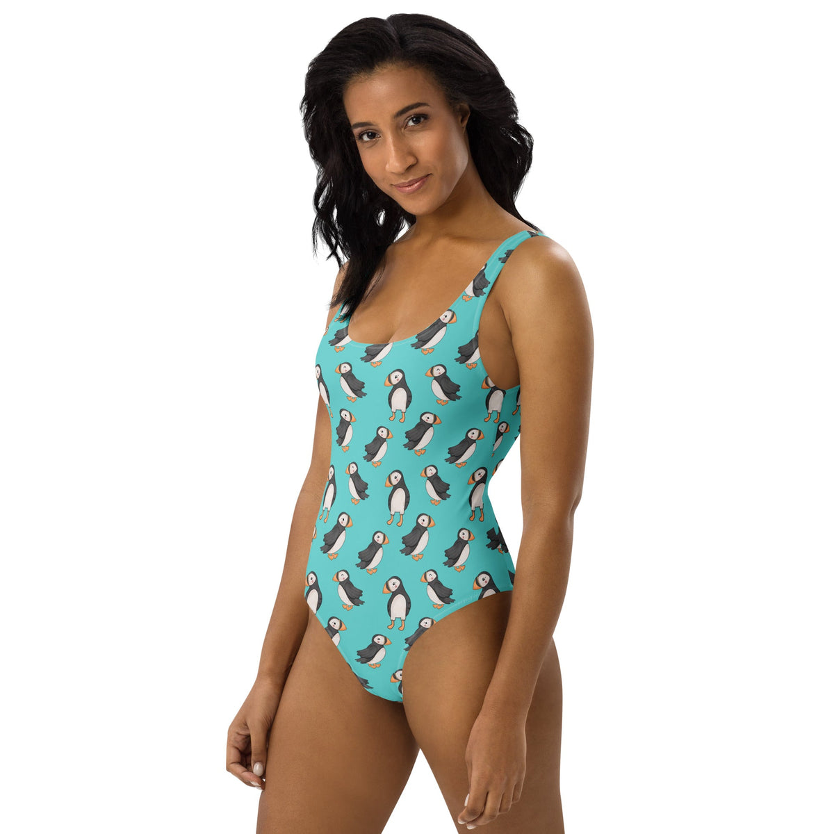 Teal one-piece swimsuit with cute puffin print from Printful, featuring an all-over puffin design and a snug, stylish fit.