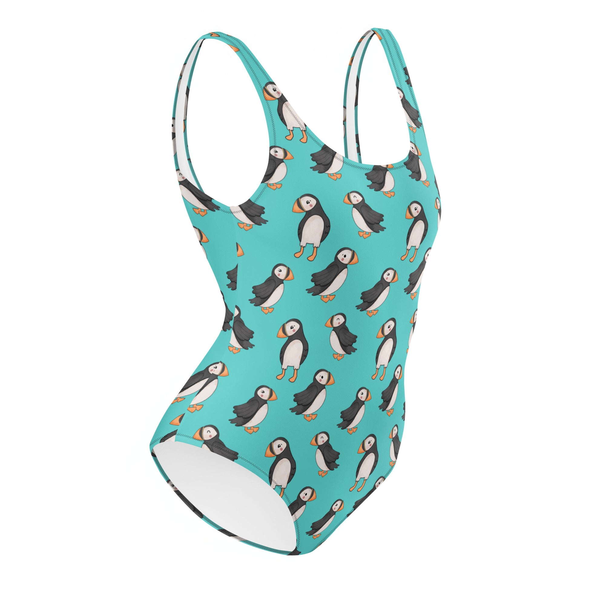 Teal one-piece swimsuit with cute puffin print from Printful, featuring an all-over puffin design on a white background.