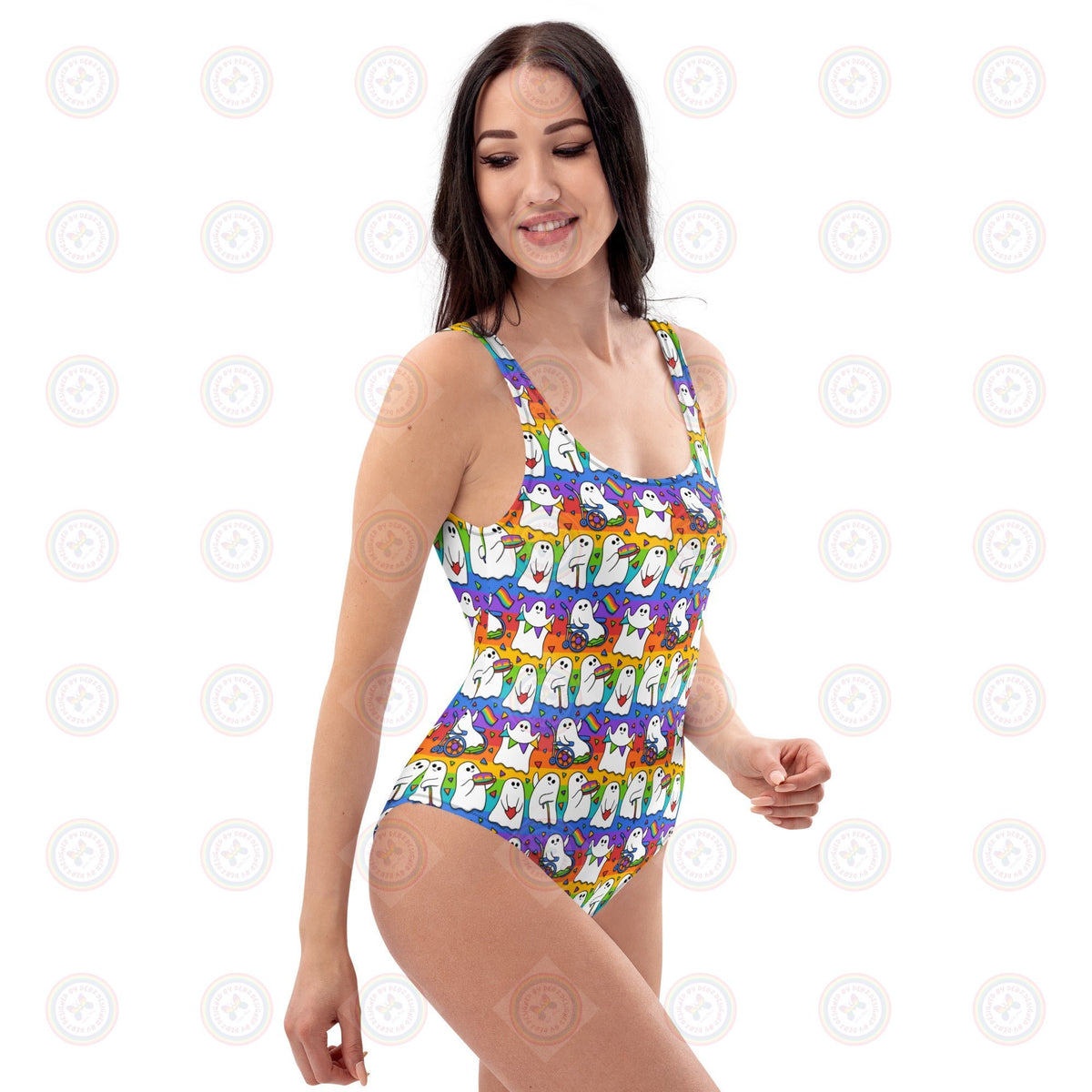 White all-over-print Wilde Mode Pride Ghosts one-piece swimsuit by Printful, featuring colorful ghost designs on a sleek fabric background.