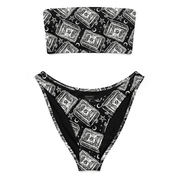 Recycled white bandeau bikini with all-over print from Spell Books by Printful, made in Latvia, shown from the front.