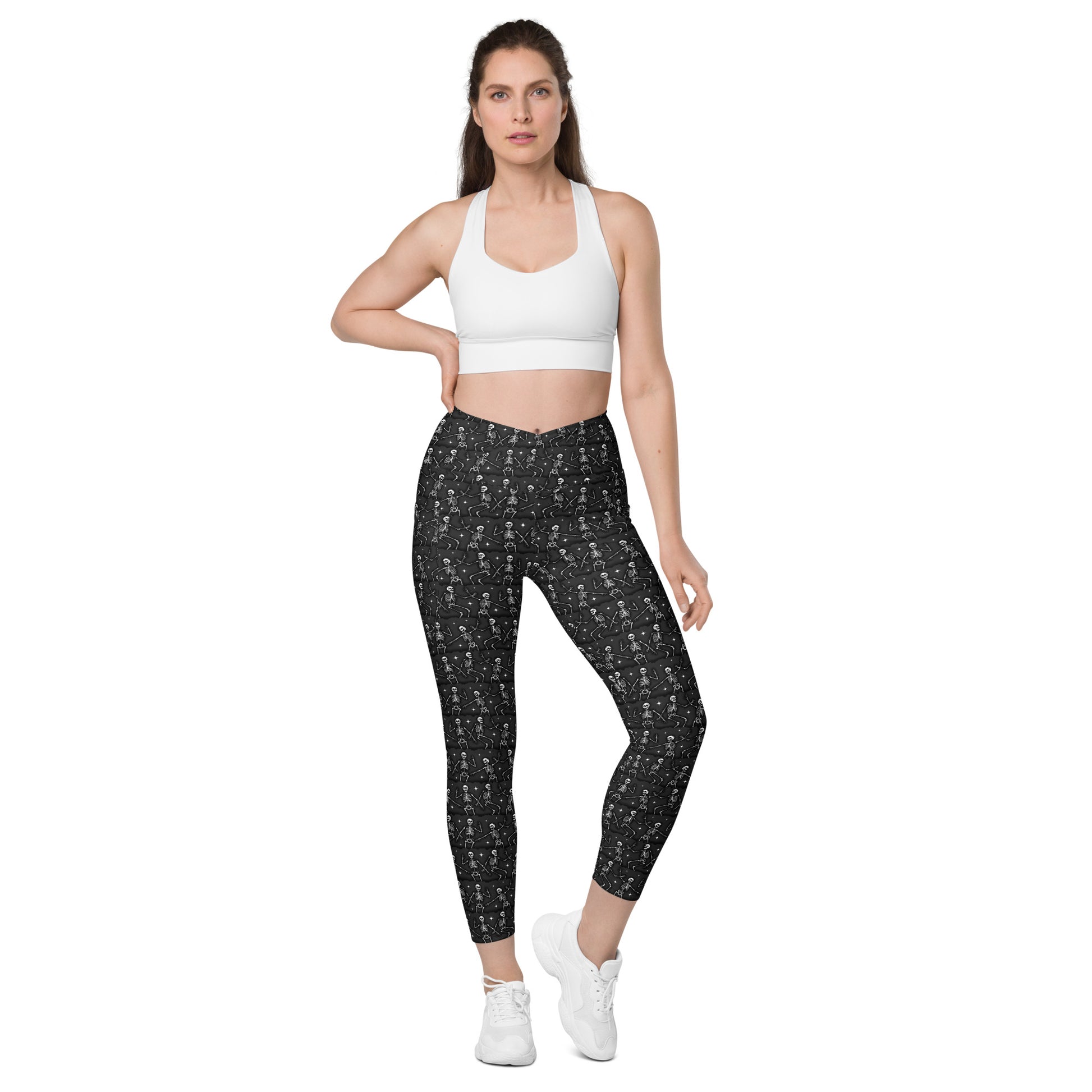 Printful DBD x Waffle Mamma Bone Dance crossover leggings with all-over white print and side pockets, designed for comfort and style.
