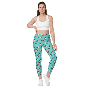 Printful Puffin Party crossover leggings with pockets featuring a colorful all-over puffin print on white background.