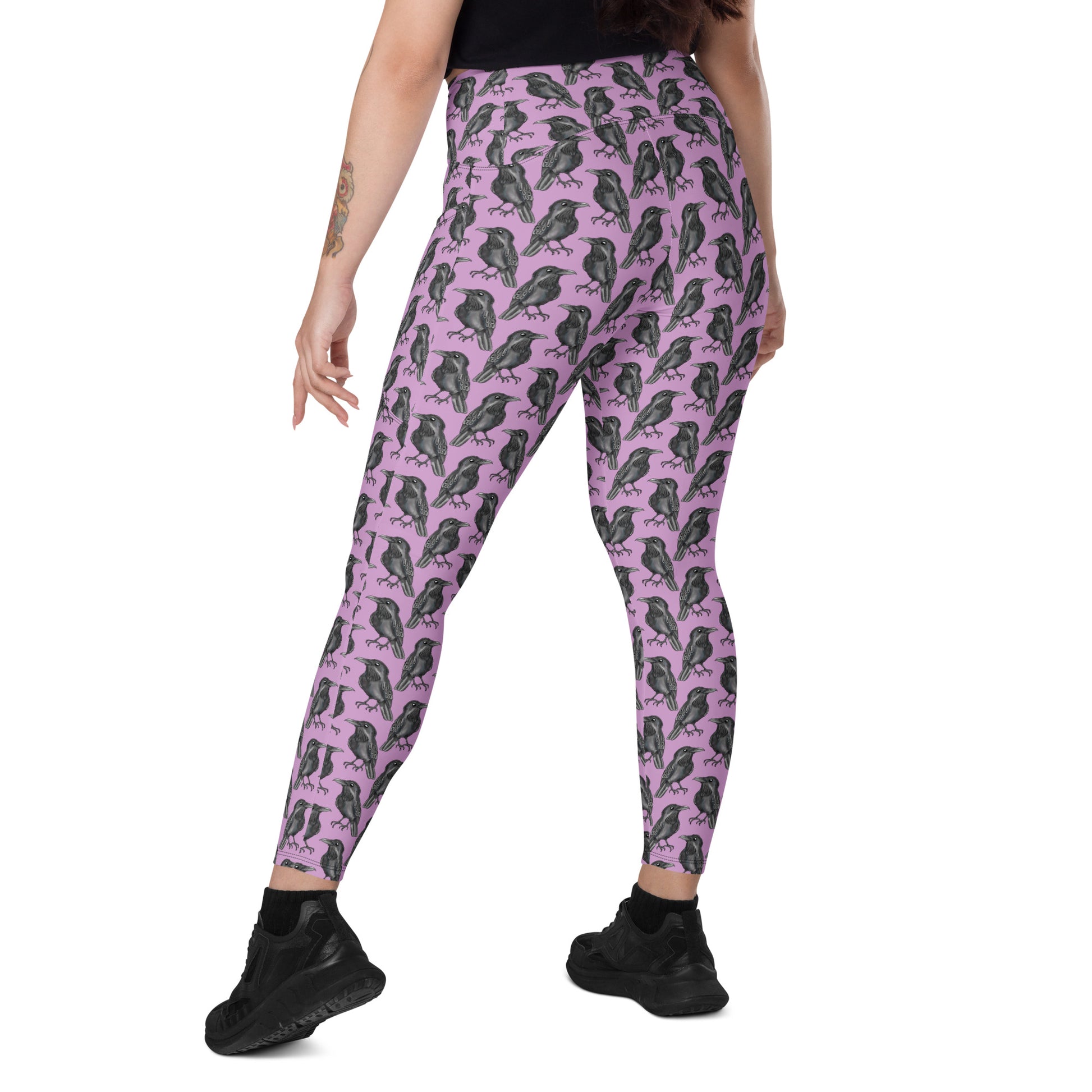 Printful Murder of Crows crossover leggings with pockets, all-over print, recycled fabric, shown from back left side.