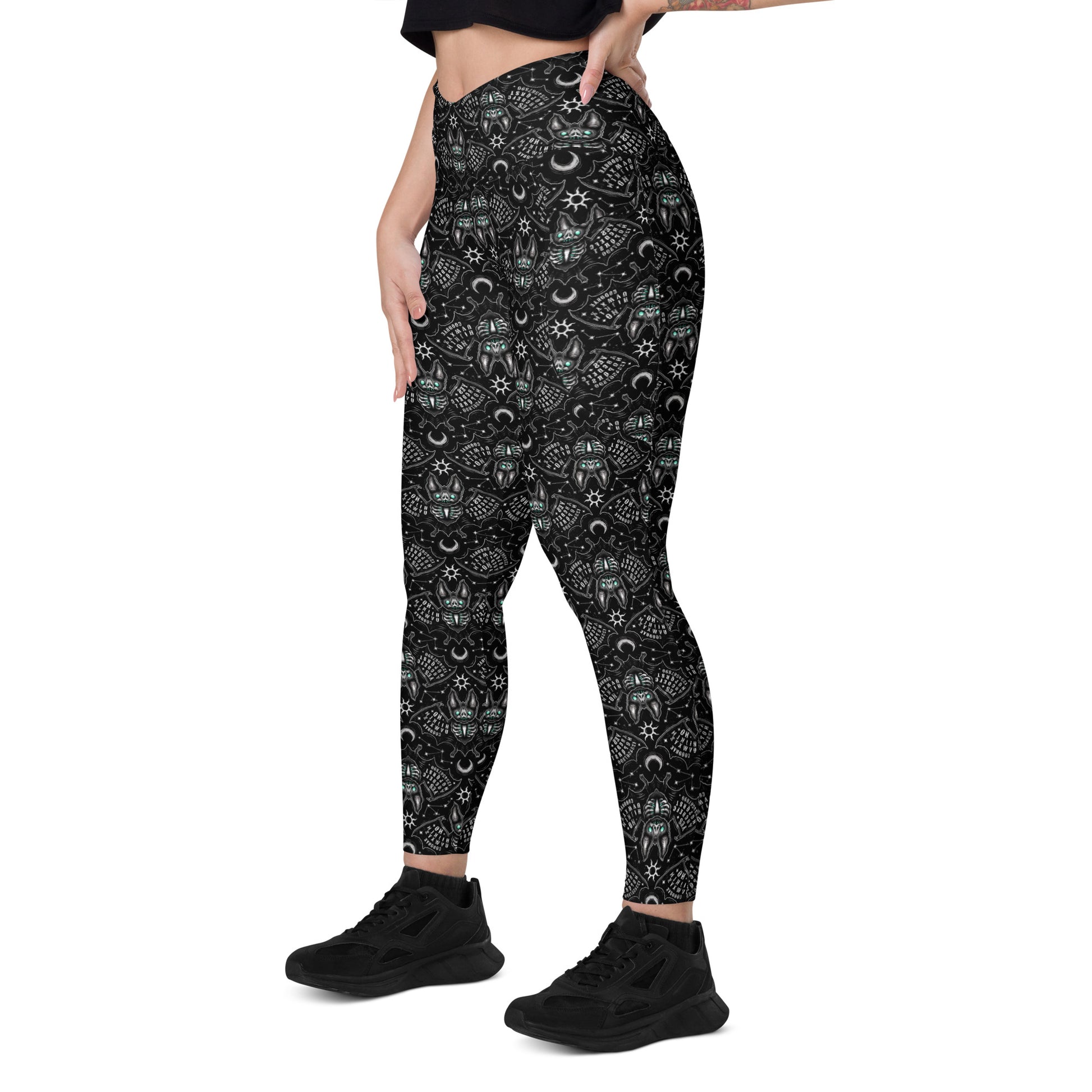 White Ouija Bats crossover leggings with pockets featuring all-over spooky bat print, made by Printful.