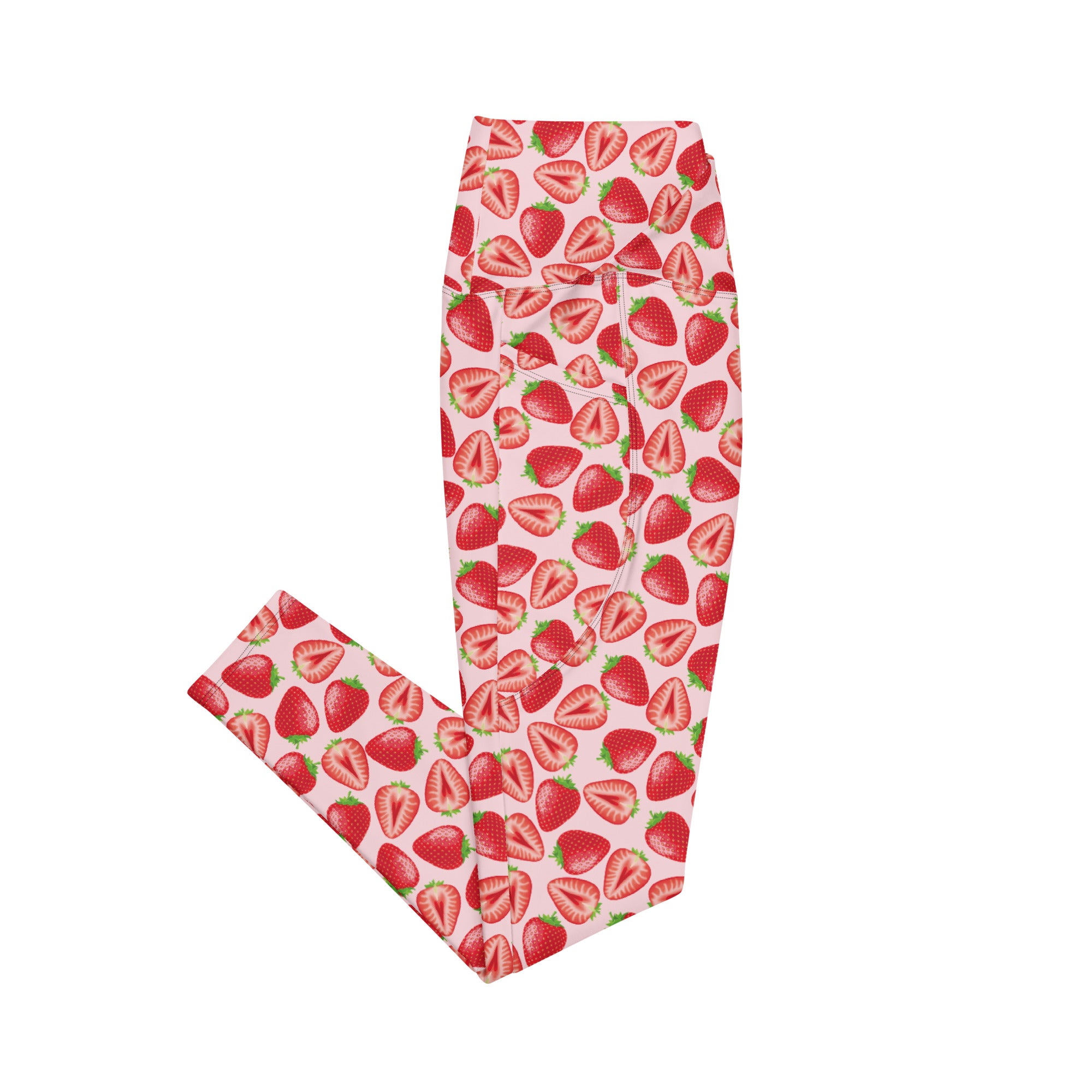 Printful crossover leggings with wild strawberry print, featuring pockets and all-over recycled fabric design in white.