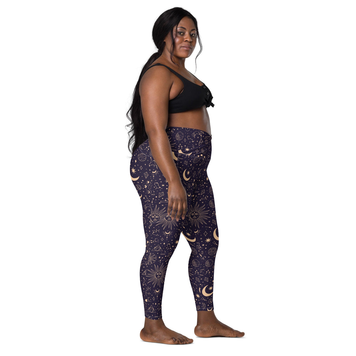 Printful Celestial Goddess crossover leggings with pockets featuring an all-over celestial print on white recycled fabric.