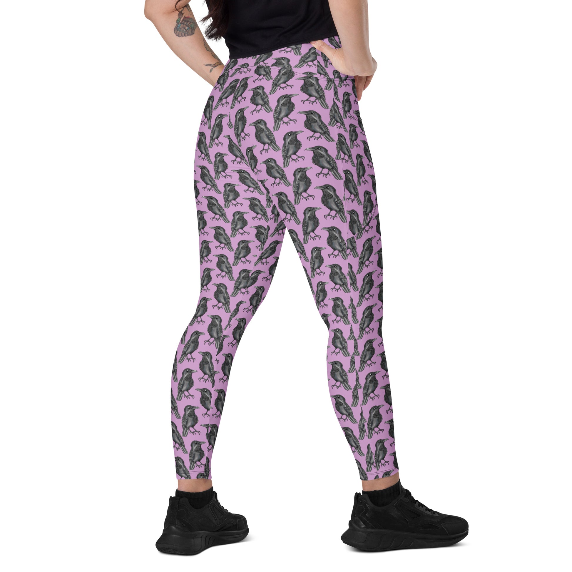 Printful Murder of Crows crossover leggings with pockets, all-over black and white crow design, shown from the right back side.