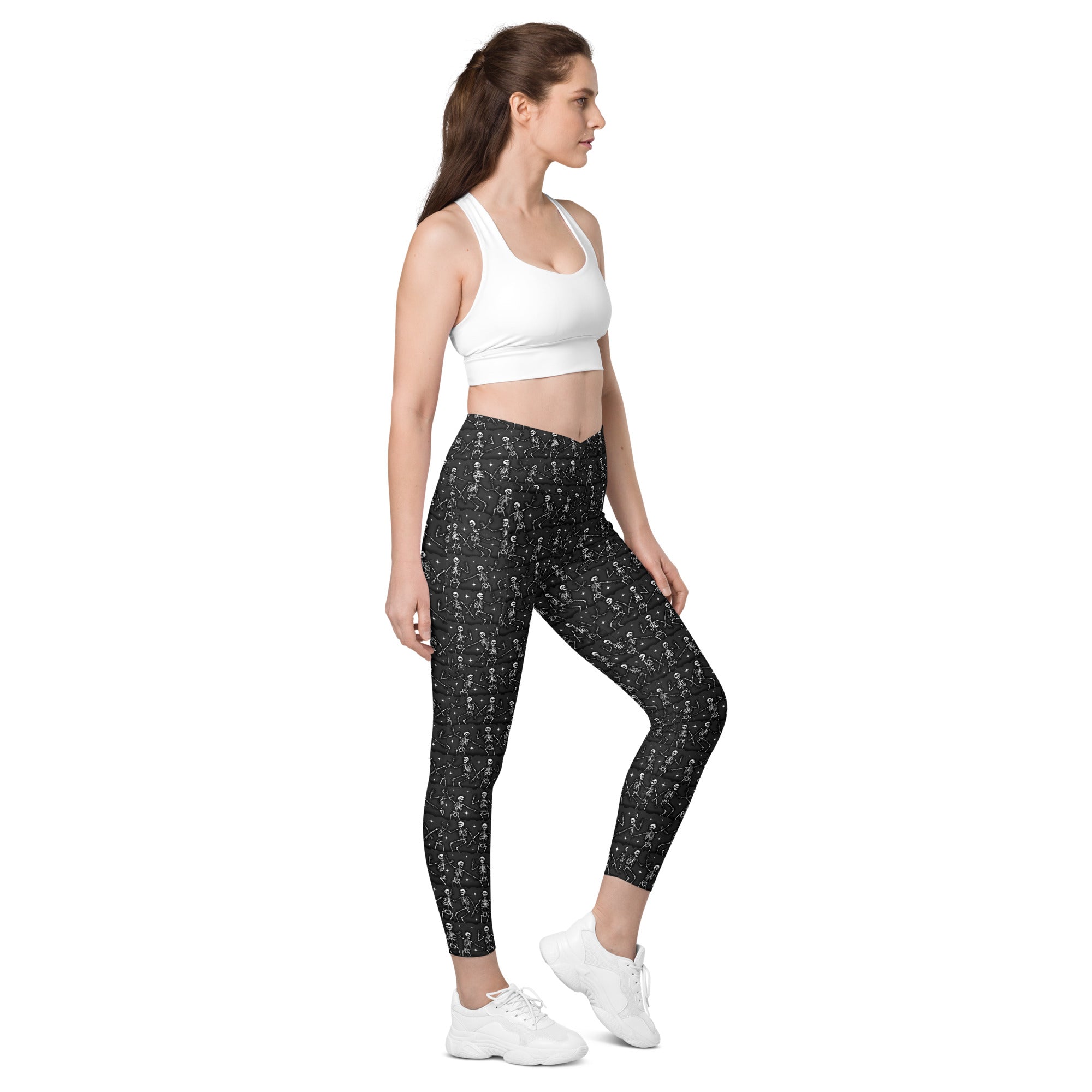 Printful DBD x Waffle Mamma Bone Dance crossover leggings with all-over print and pockets, shown from the right front view.