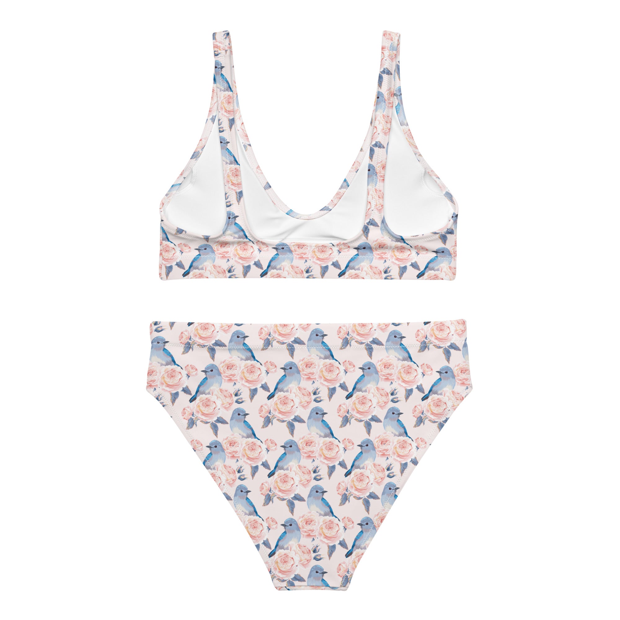 Recycled high-waisted bikini from Printful with bluebird and rose print on peach fabric, shown from the back.