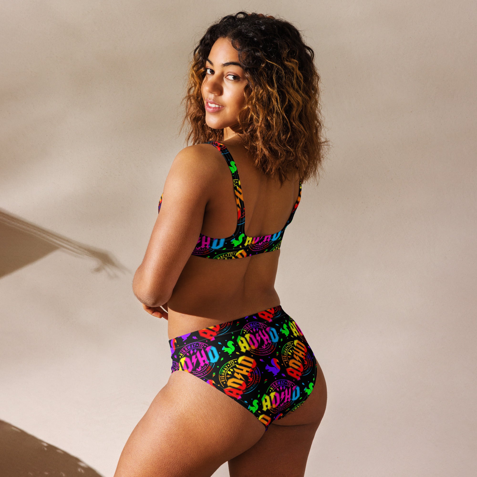 Recycled high-waisted bikini with ADHD squirrel print in white, featuring all-over colorful squirrel pattern, back view.