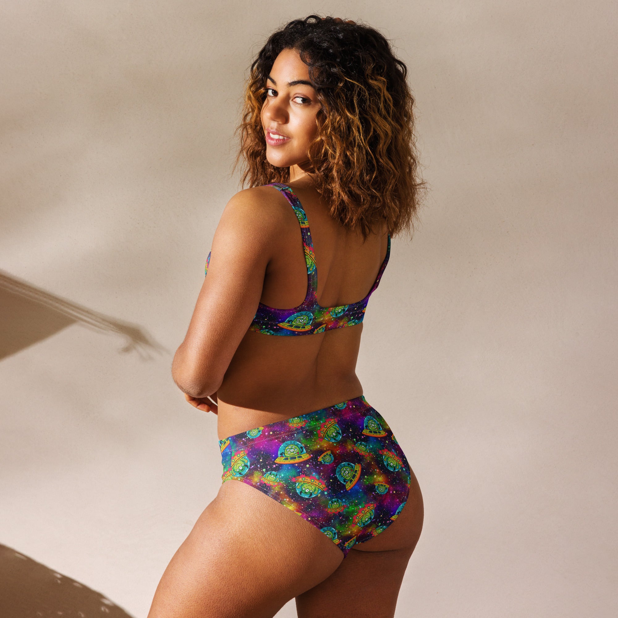 Recycled high-waisted bikini with aliens in space print, white background, front view, available in XS to 3XL, by Printful.