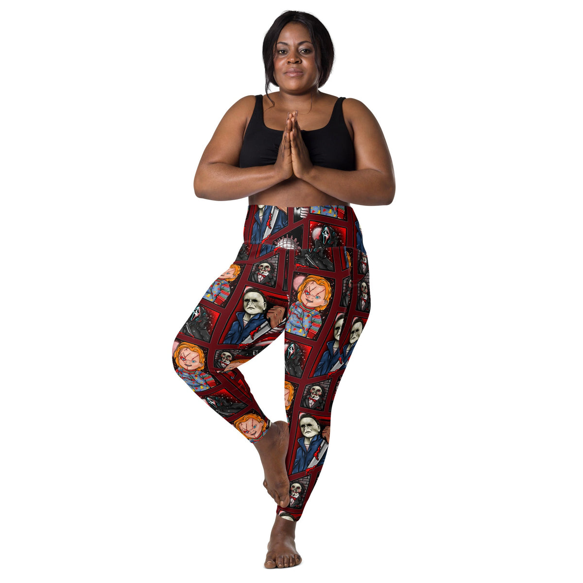 Recycled horror legends leggings with pockets by Printful, featuring all-over spooky print on white background.