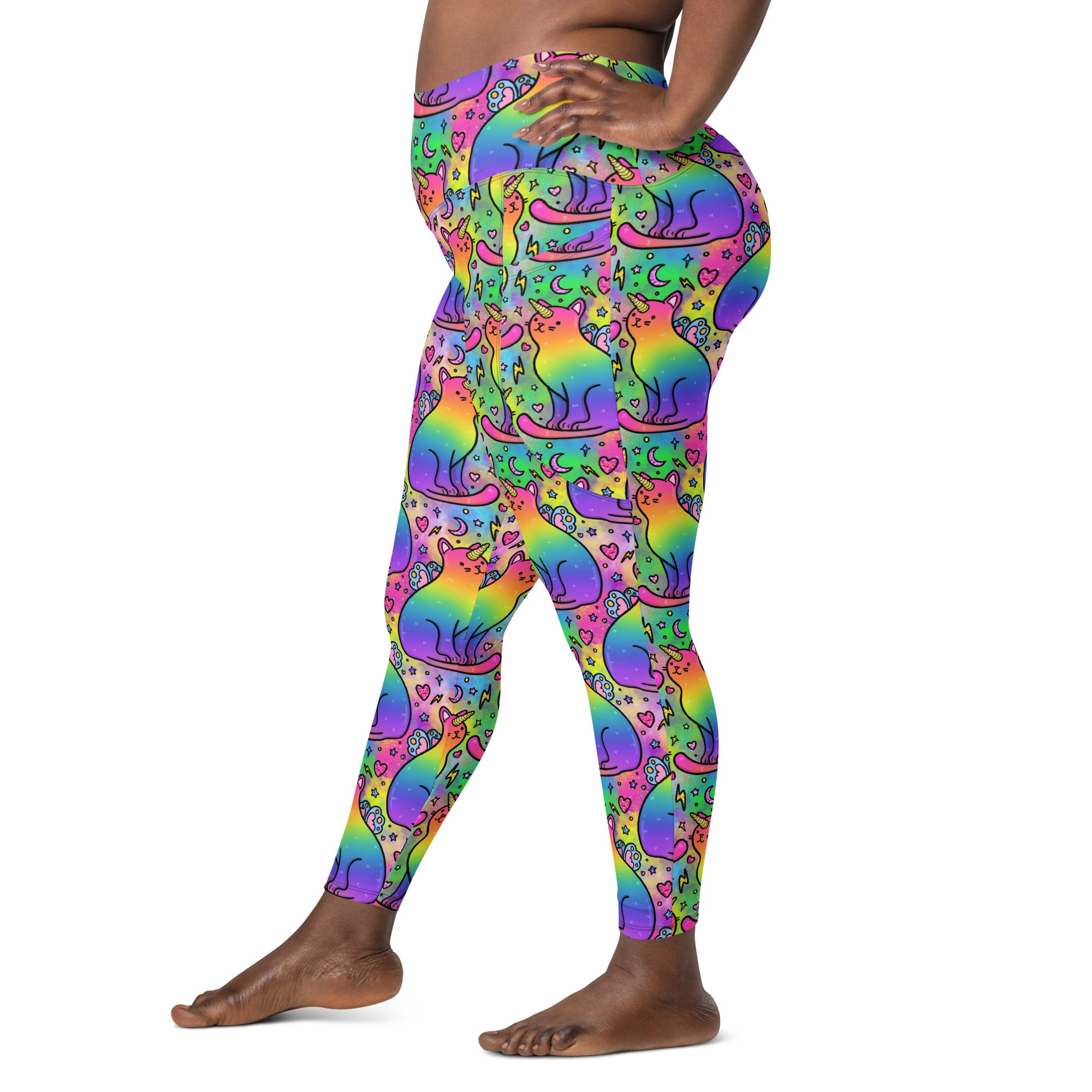 Recycled unicorn cats leggings with pockets by Designed By Debz, featuring colorful all-over print on white fabric.