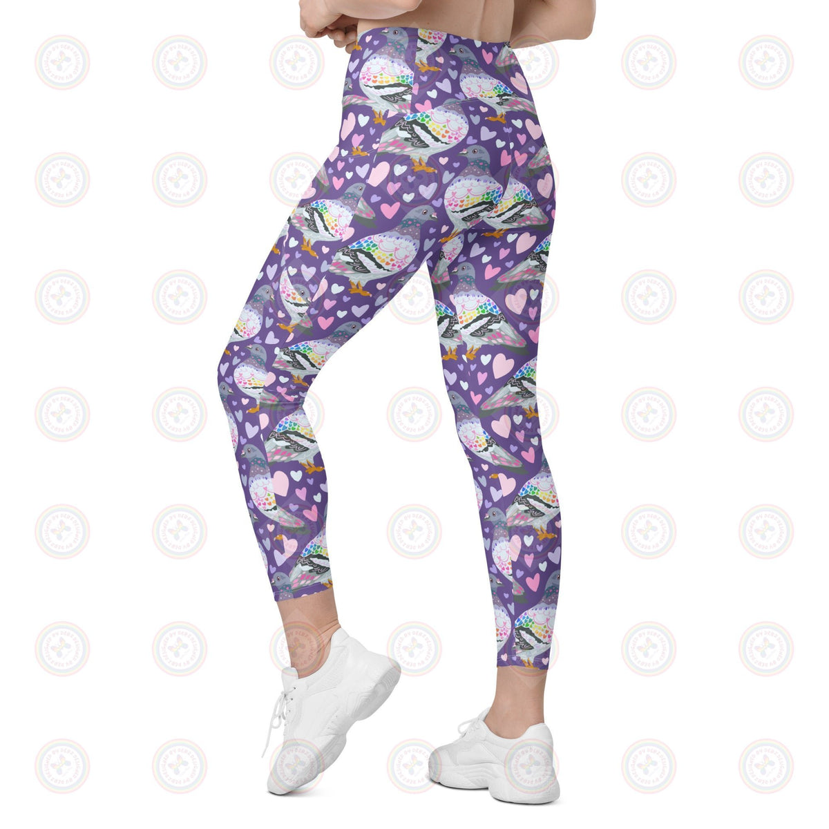 Recycled leggings by Printful featuring a white all-over pigeon print with side pockets, designed for comfort and eco-friendly fashion.