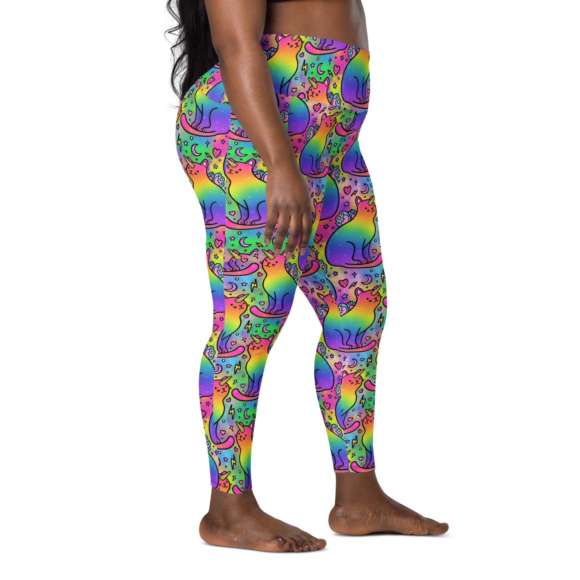 Designed By Debz unicorn cats leggings with pockets, all-over print, made from recycled materials, shown on a white background.