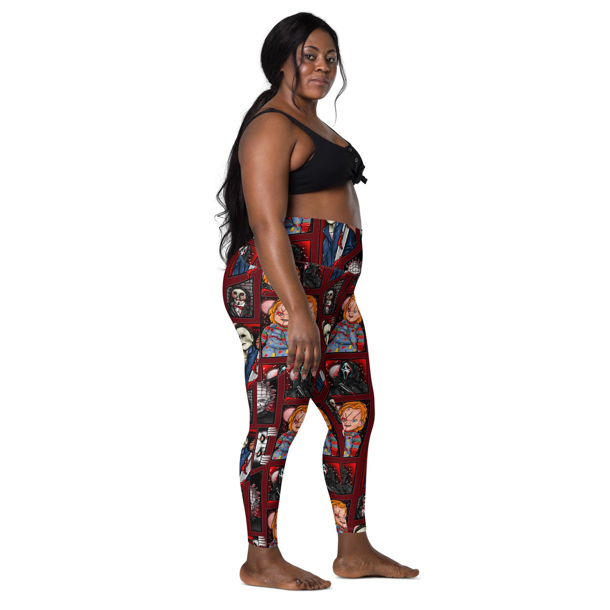 Recycled horror legends leggings with pockets from Printful featuring all-over spooky print on white background.
