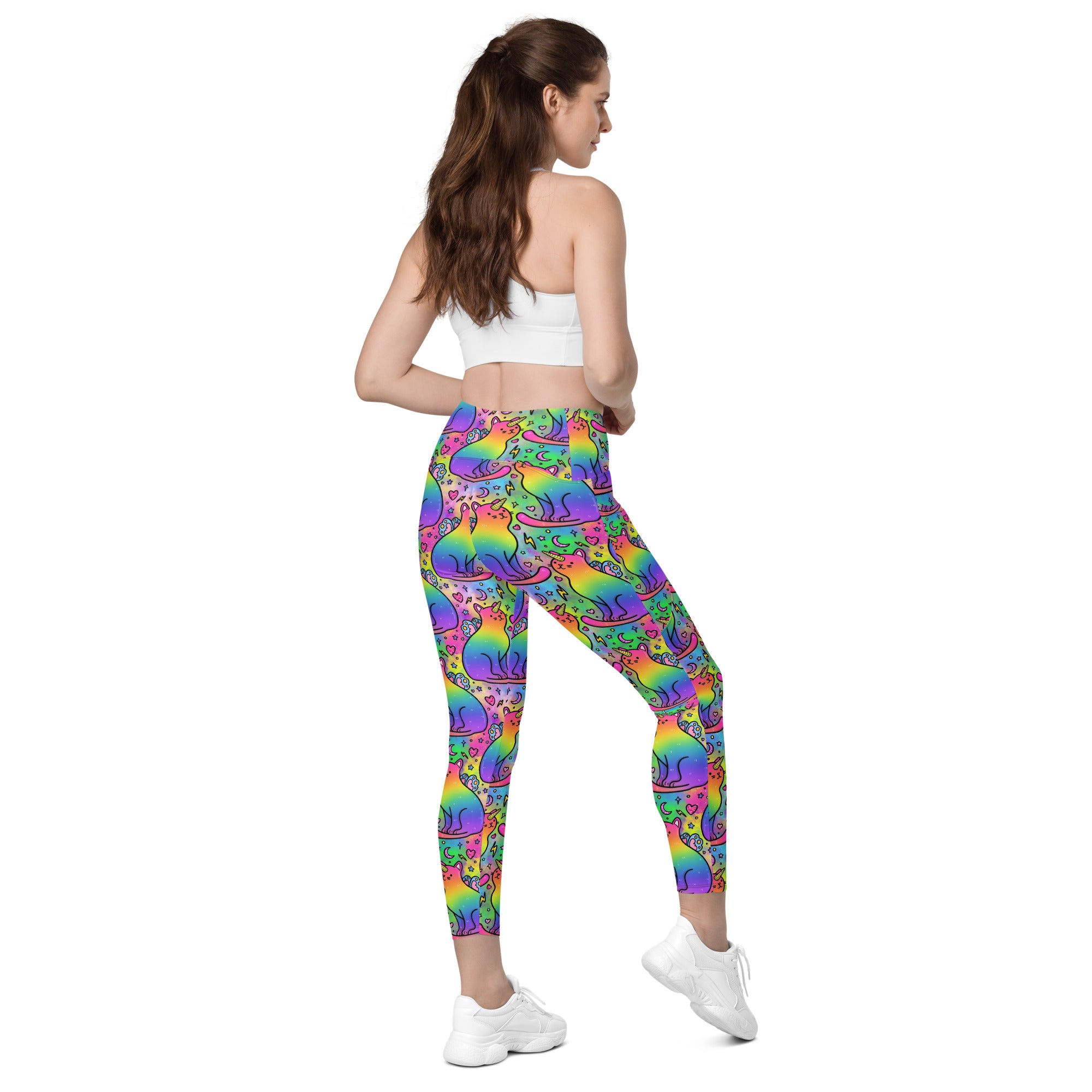 Designed By Debz unicorn cats leggings with pockets, featuring colorful all-over print on recycled fabric, shown from the back.