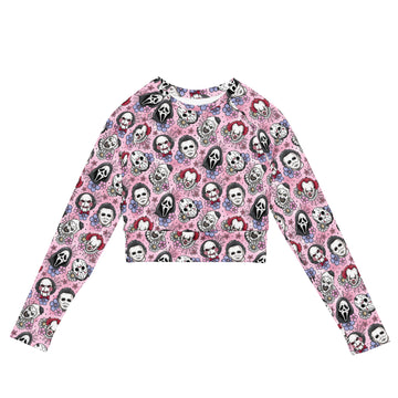 Pink Horror Characters recycled long-sleeve crop top rash guard with all-over print, featuring vibrant horror-themed artwork.