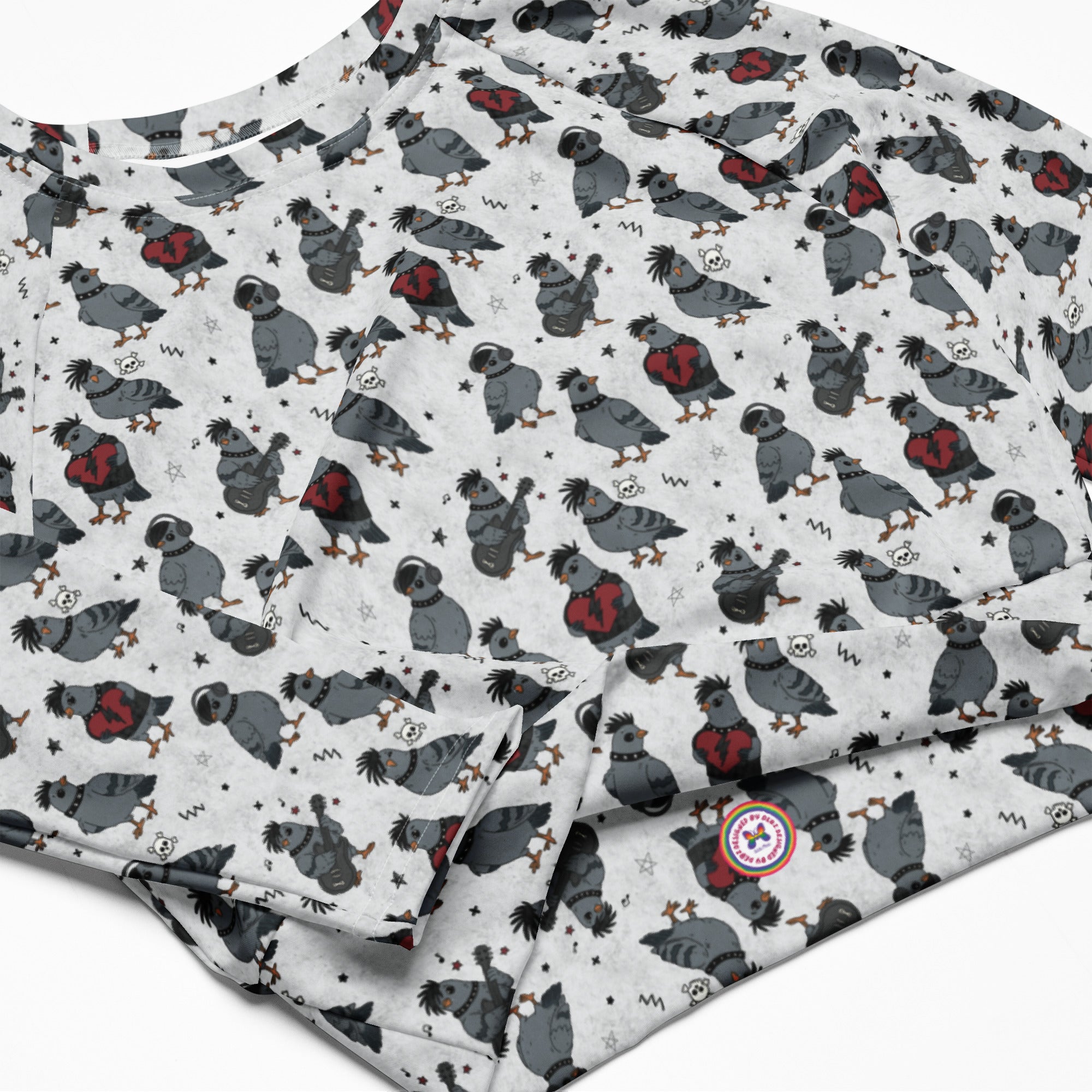 White Emo Pigeons recycled long-sleeve crop top rash guard with all-over print, featuring colorful pigeon designs.