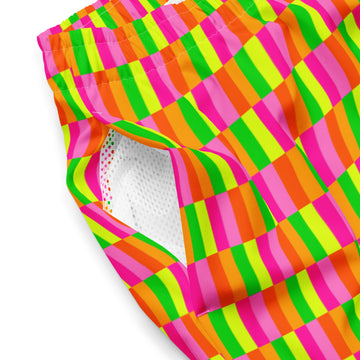 Printful Swim Safe swim trunks with neon geometric print, made from recycled materials, featuring a vibrant all-over design.