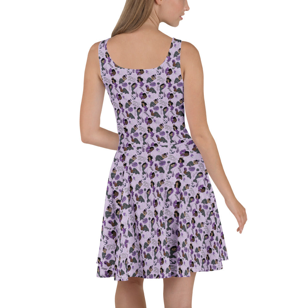 White all-over-print skater dress featuring merpeople design from Wilde Mode X Arkolina, made to order by Printful.