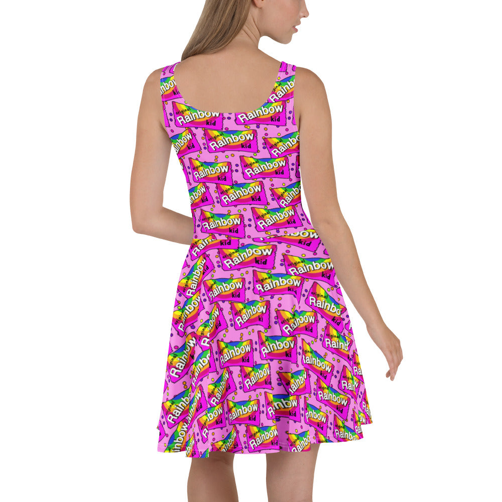 Rainbow Kid Recycled Skater Dress by Designed By Debz with vibrant all-over print, shown from the back on a white background.