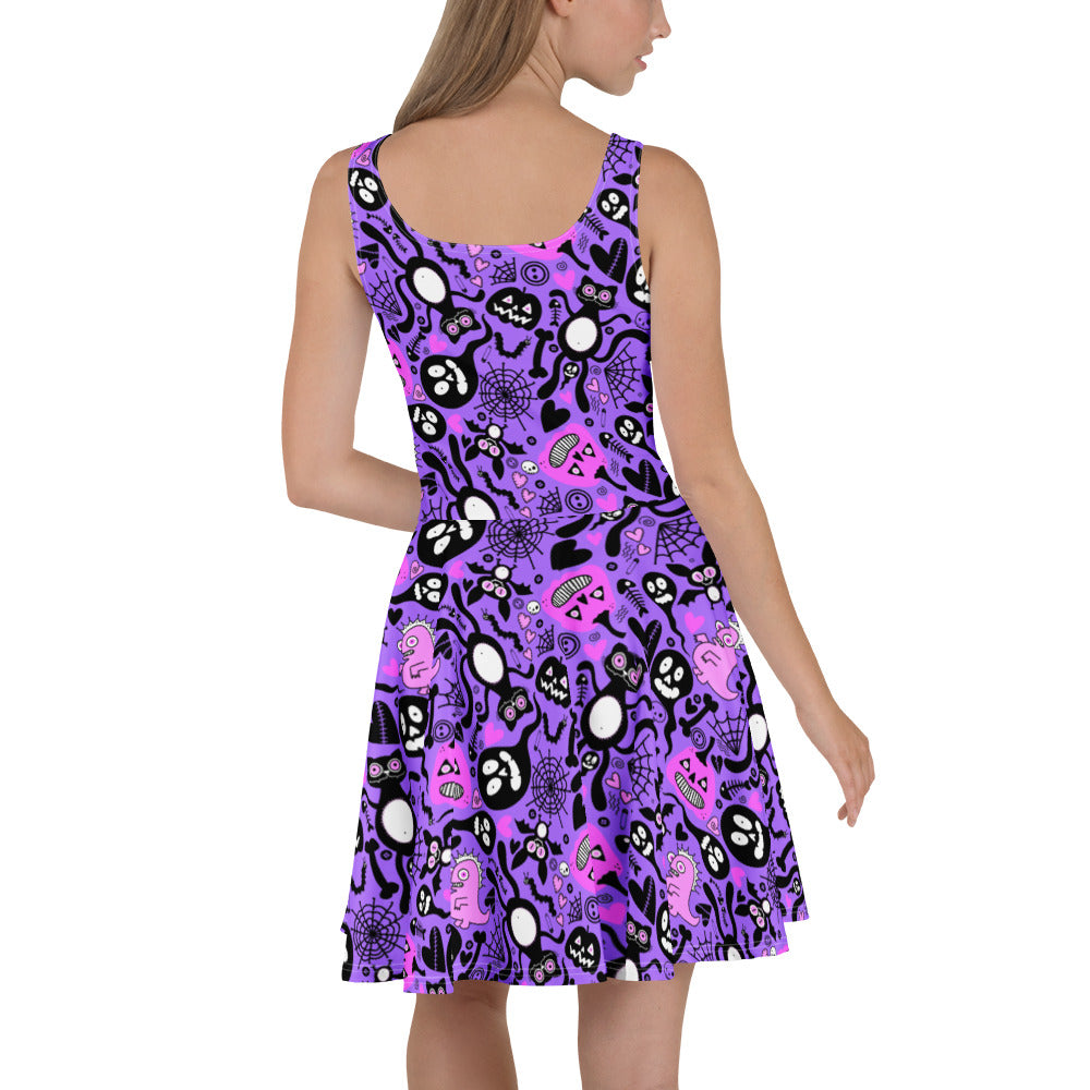 Purple Spooky Doodle Skater Dress by Designed By Debz, all-over print with a white back, available in XS to 3XL sizes.