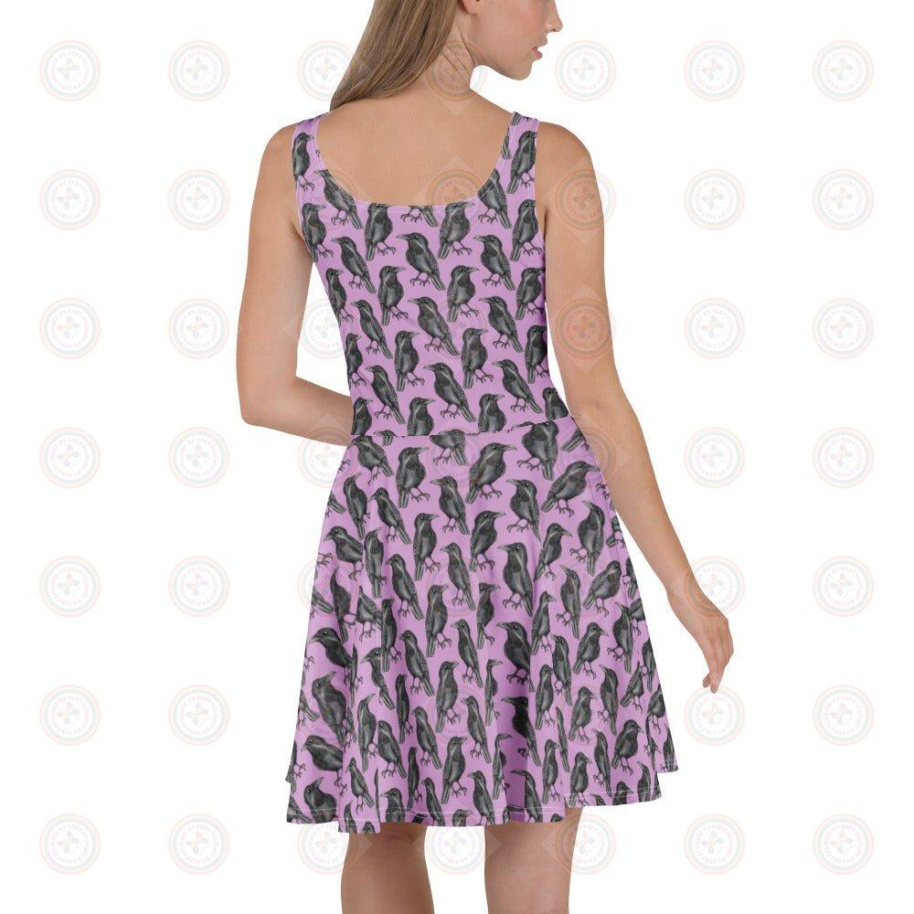 White all-over-print skater dress by A Murder of Crows, made from recycled materials, with a fitted waist and flared skirt.