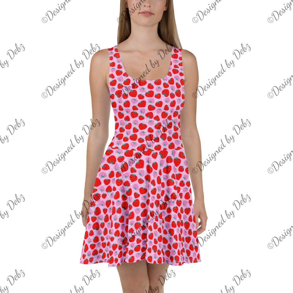 White Scrummy Strawberries Skater Dress by Printful featuring a colorful strawberry print on a flattering, all-over design.