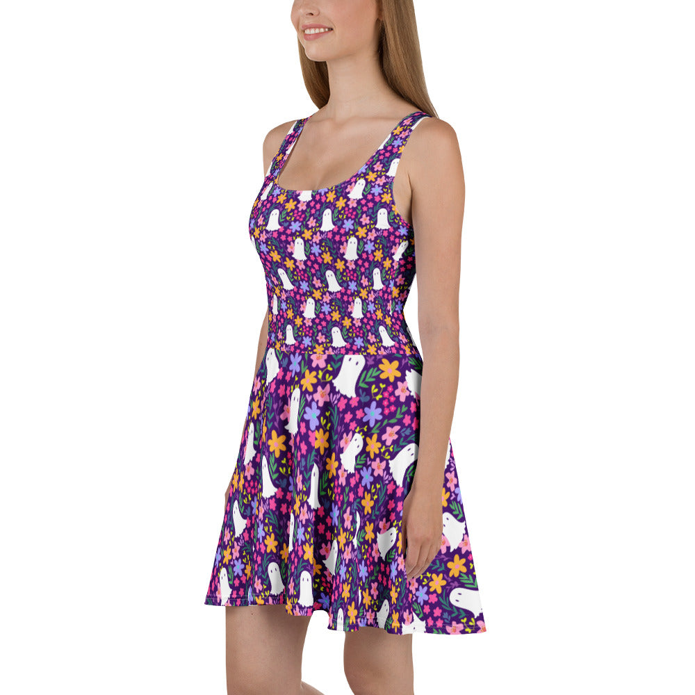 White Summer Boo skater dress with colorful all-over print, designed by Printful, shown hanging on a white background.