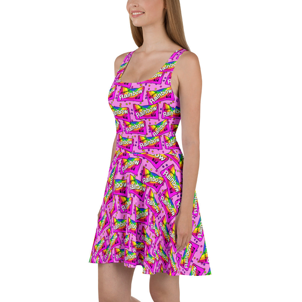 Rainbow Kid recycled skater dress by Designed By Debz featuring an all-over colorful print on white fabric.